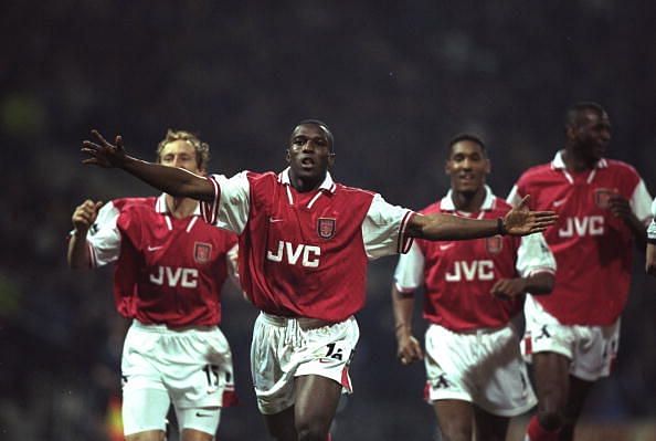 31 Mar 1998: Arsenal striker Christopher Wreh celebrates scoring the winning goal